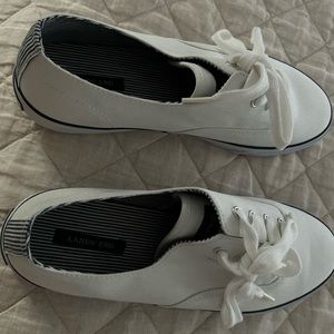 Never worn. No box size 11 Women’s Tennis Shoes